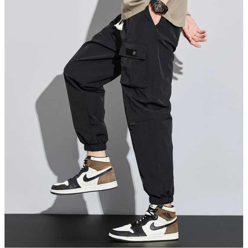 Tapered Elasticity Multi-Pocket Zipper Cargo Pants