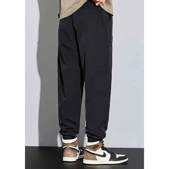 Tapered Elasticity Multi-Pocket Zipper Cargo Pants