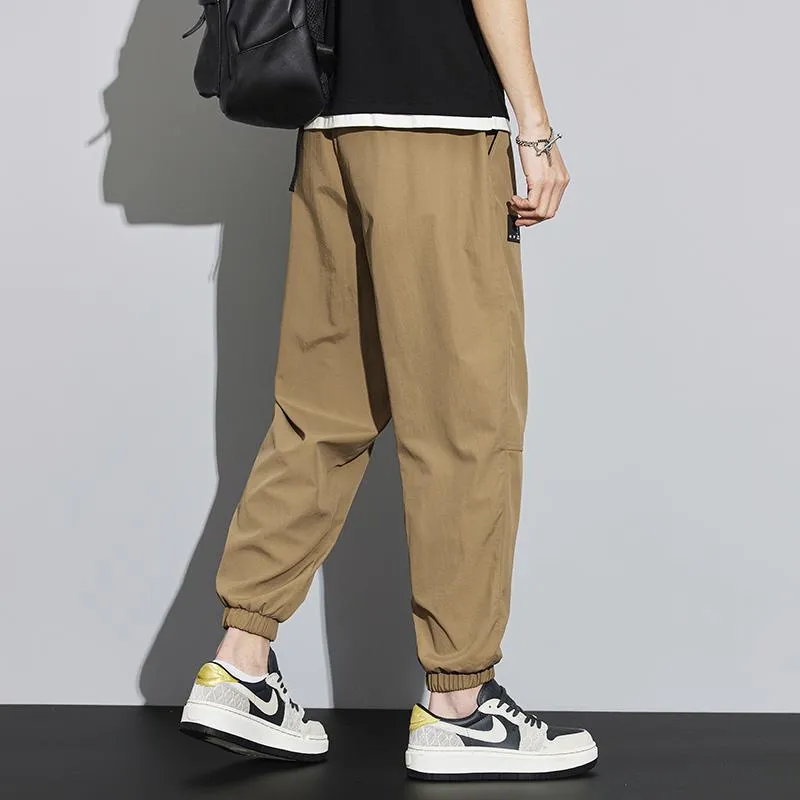 Tapered Elasticity Multi-Pocket Zipper Cargo Pants