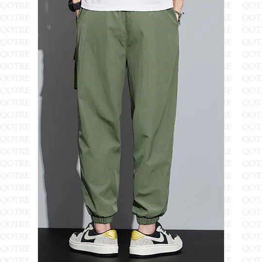 Tapered Elasticity Multi-Pocket Zipper Cargo Pants