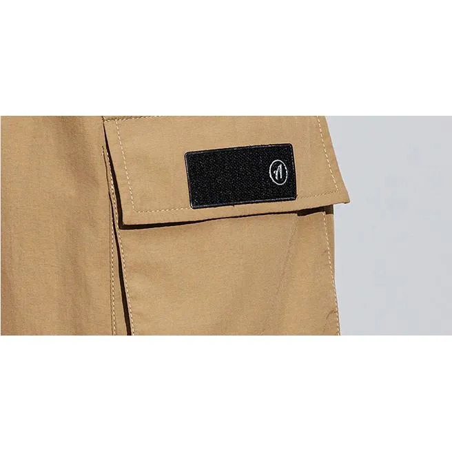 Tapered Elasticity Multi-Pocket Zipper Cargo Pants
