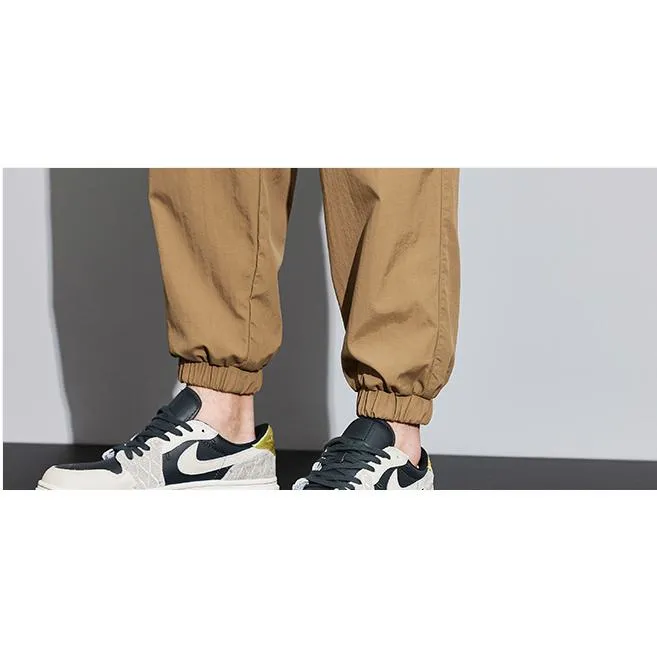 Tapered Elasticity Multi-Pocket Zipper Cargo Pants