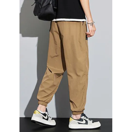 Tapered Elasticity Multi-Pocket Zipper Cargo Pants
