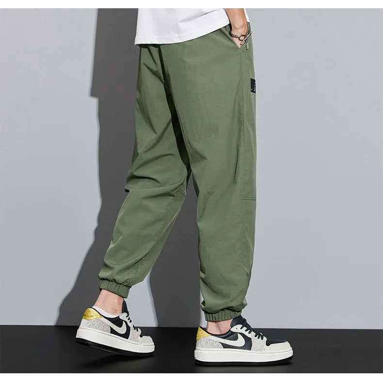 Tapered Elasticity Multi-Pocket Zipper Cargo Pants