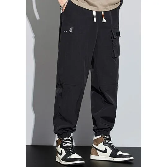 Tapered Elasticity Multi-Pocket Zipper Cargo Pants